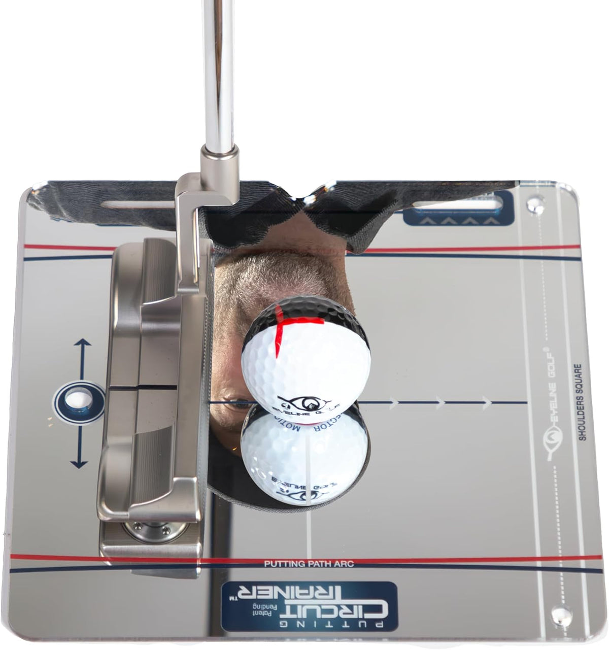 Putting Circuit Trainer – Spiegel-Platte mit Putter und Ball, im Spiegel das Gesicht über dem Ball
